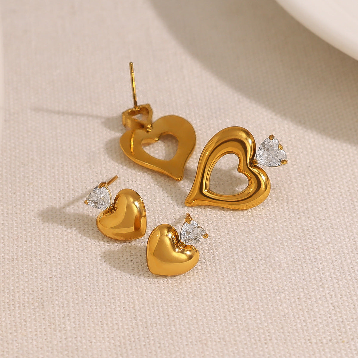 Women's Steel Hollow Diamond Double Heart Simple Glossy Earrings