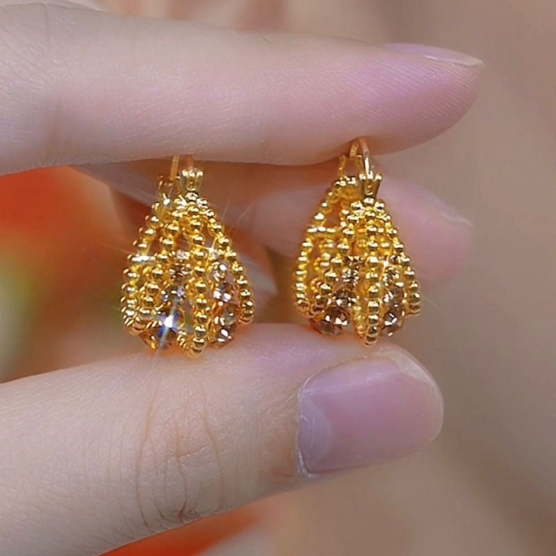 High-grade Brown Hollow Flower Basket Ear Clip Female Niche Earrings