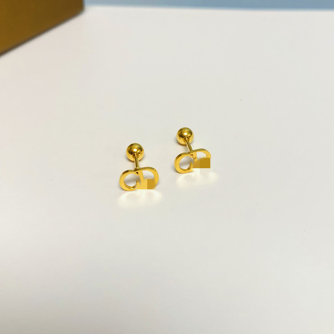 Women's Simple Small Golden Ear Bone Titanium Rings