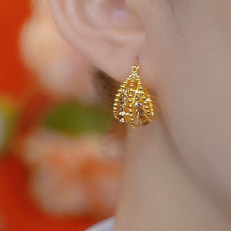 High-grade Brown Hollow Flower Basket Ear Clip Female Niche Earrings