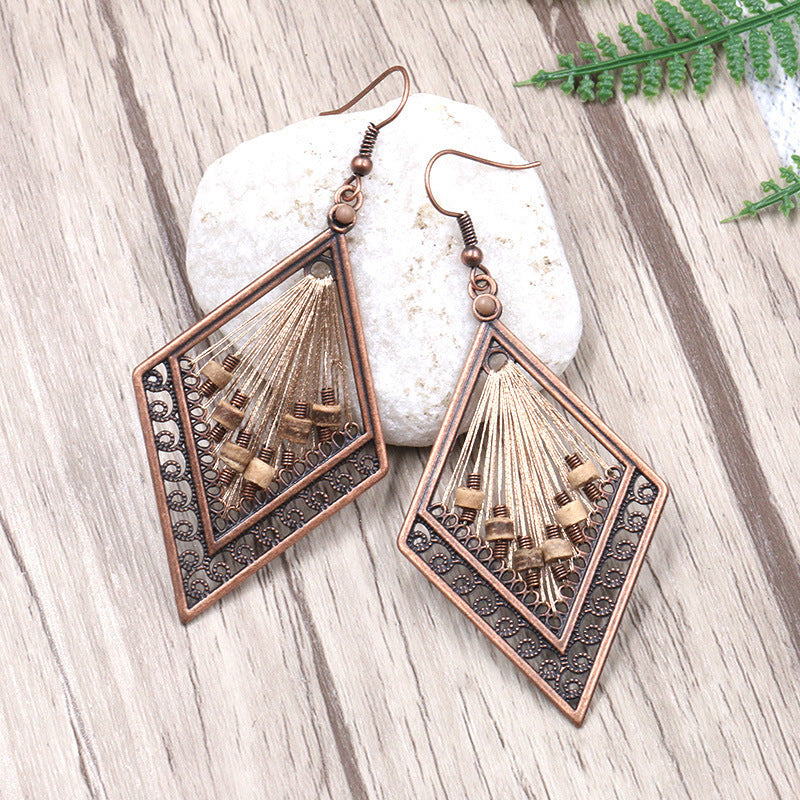 Women's Vintage Tassel Fashion U-shaped Hand-woven Exaggerated Earrings