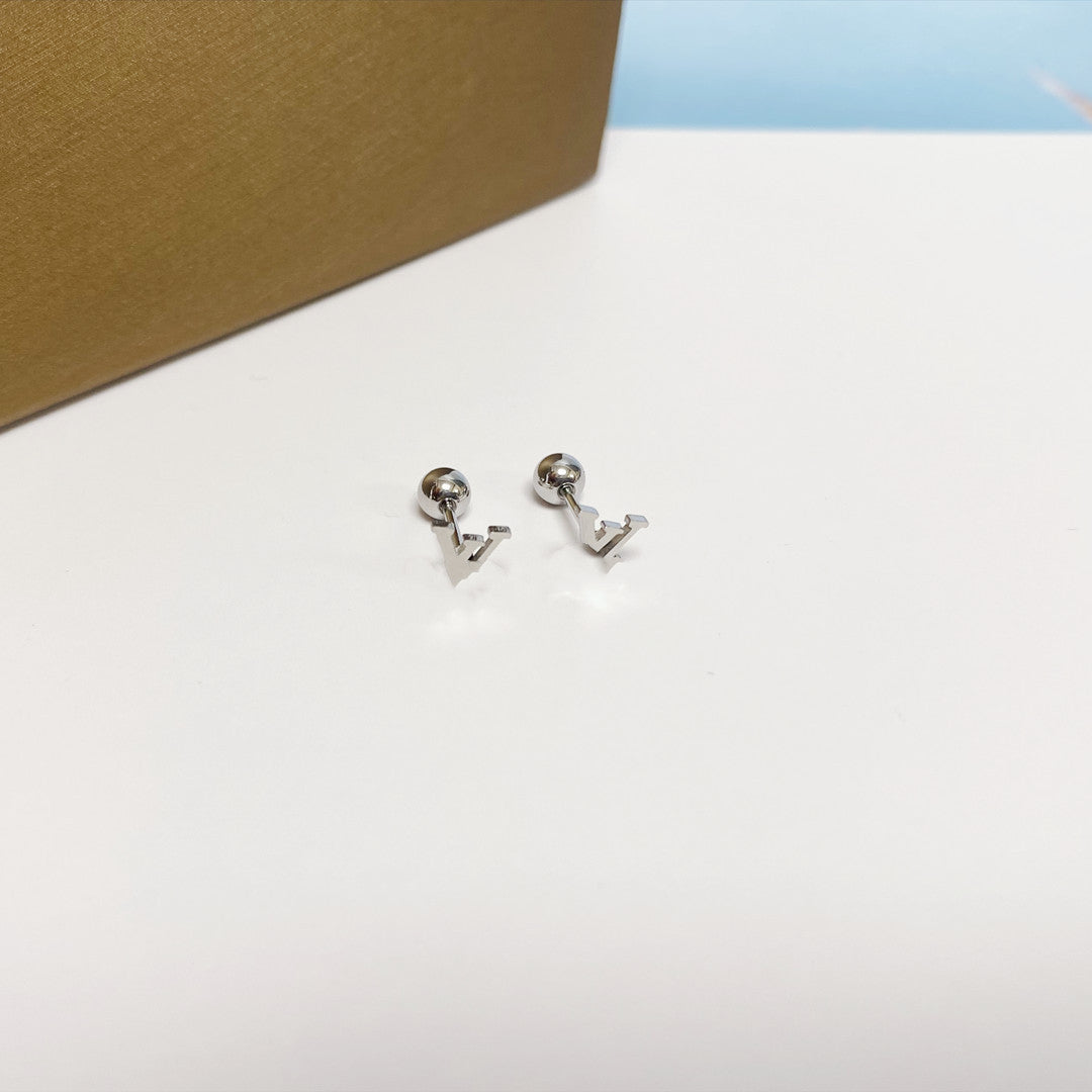 Women's Simple Small Golden Ear Bone Titanium Rings