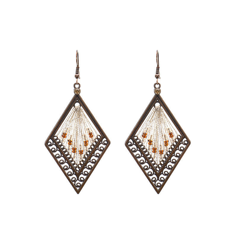 Women's Vintage Tassel Fashion U-shaped Hand-woven Exaggerated Earrings
