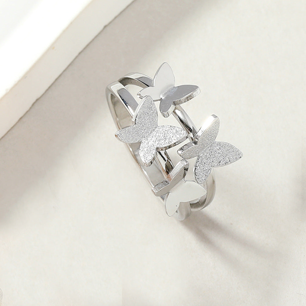 Women's Steel Ornament Cutting Welding Four Frosted Rings
