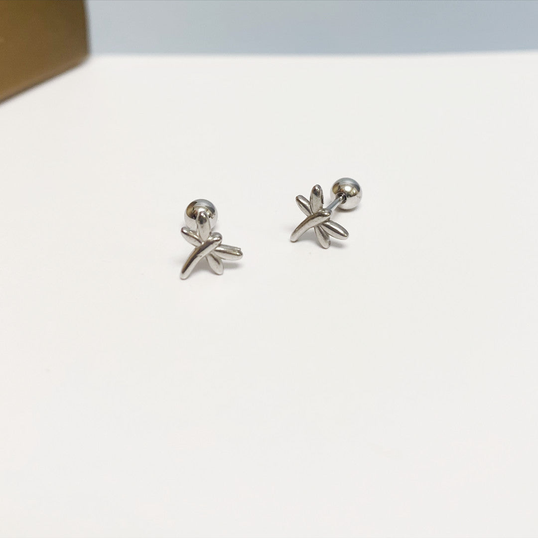 Women's Simple Small Golden Ear Bone Titanium Rings