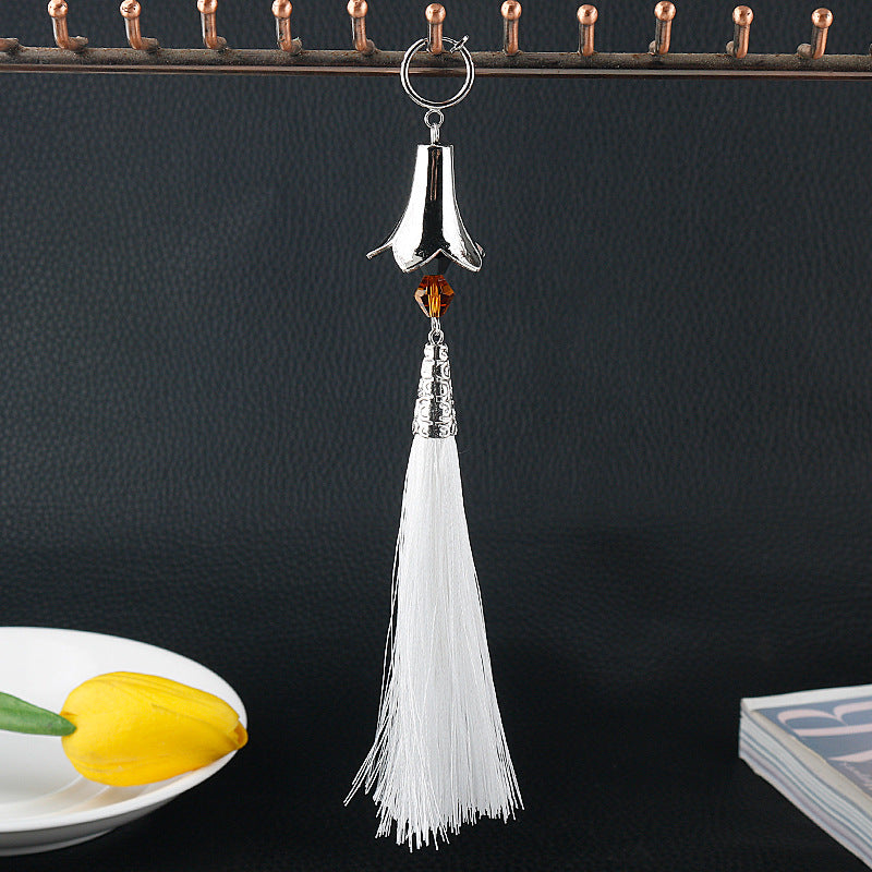 Travelers Empty Autumn Unilateral Temperament Feather Tassel Carved Earrings