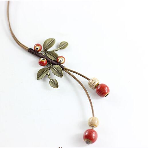 Women's Woven Ceramic High Temperature Flower Glaze Clavicle Chain Sweater Necklaces