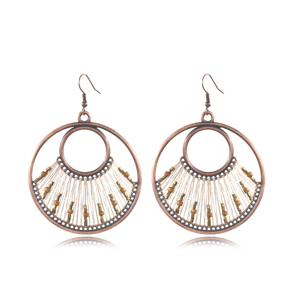 Women's Vintage Tassel Fashion U-shaped Hand-woven Exaggerated Earrings