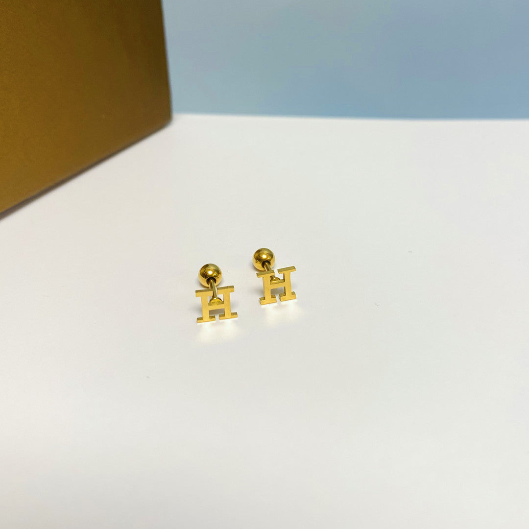 Women's Simple Small Golden Ear Bone Titanium Rings