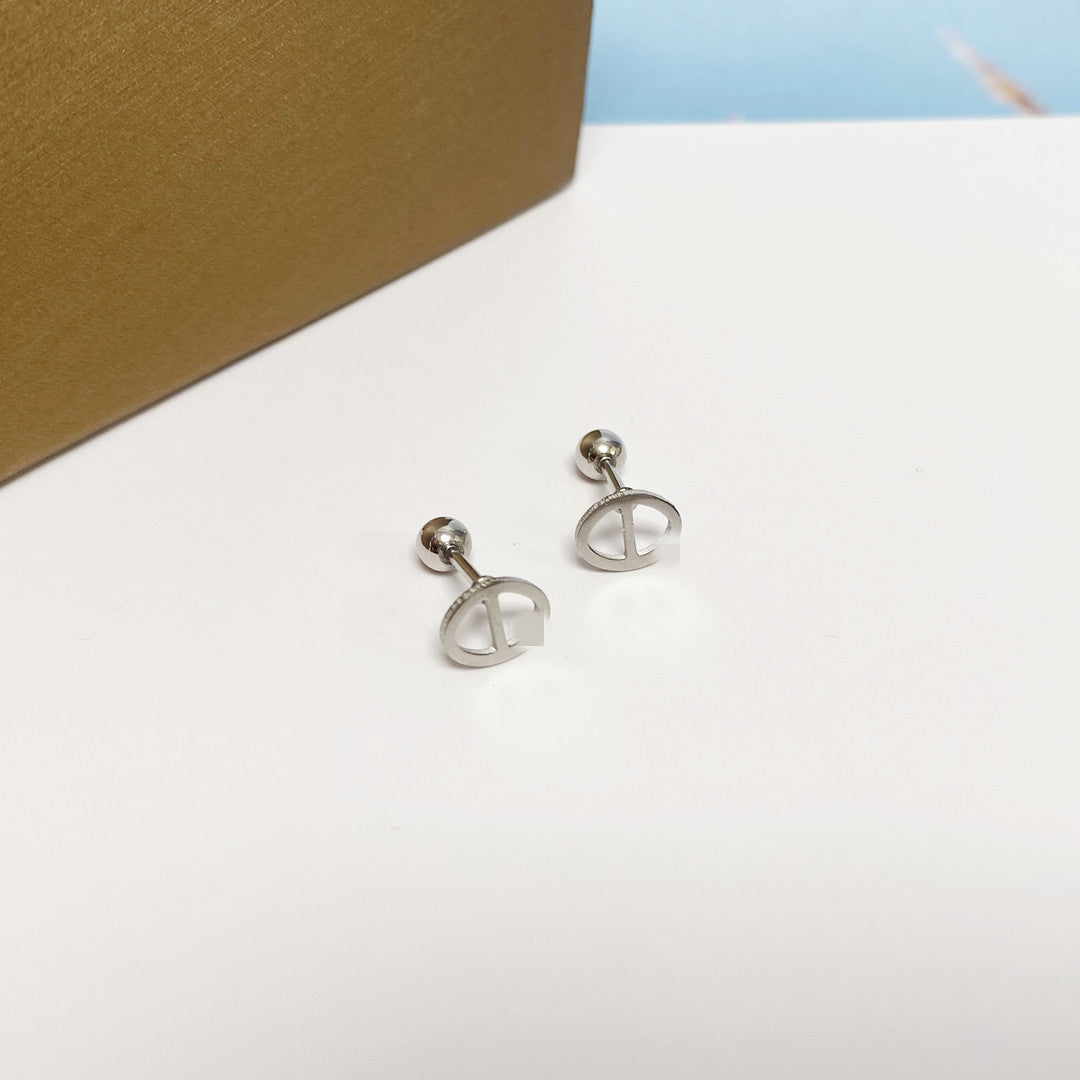 Women's Simple Small Golden Ear Bone Titanium Rings