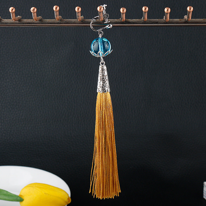 Travelers Empty Autumn Unilateral Temperament Feather Tassel Carved Earrings