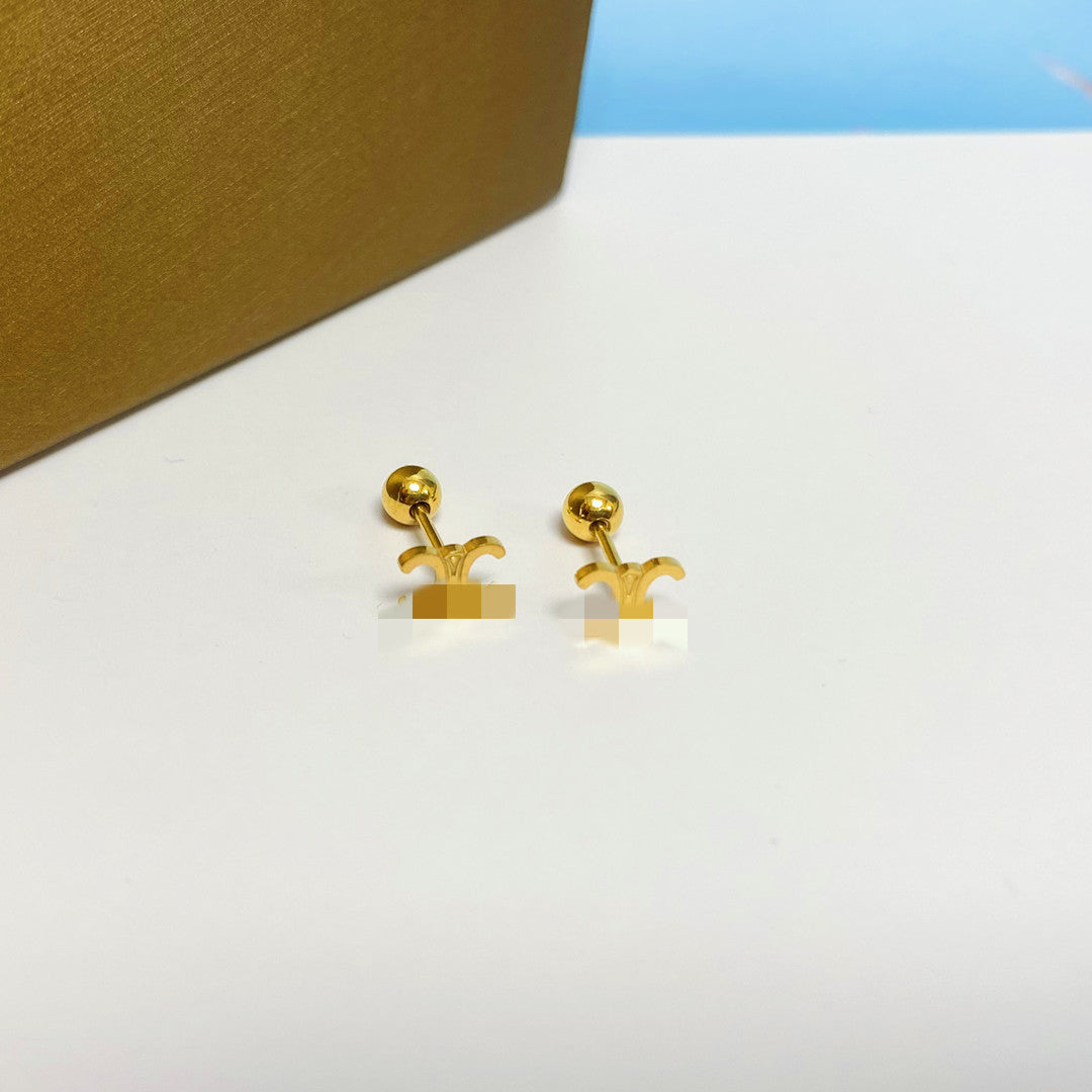Women's Simple Small Golden Ear Bone Titanium Rings