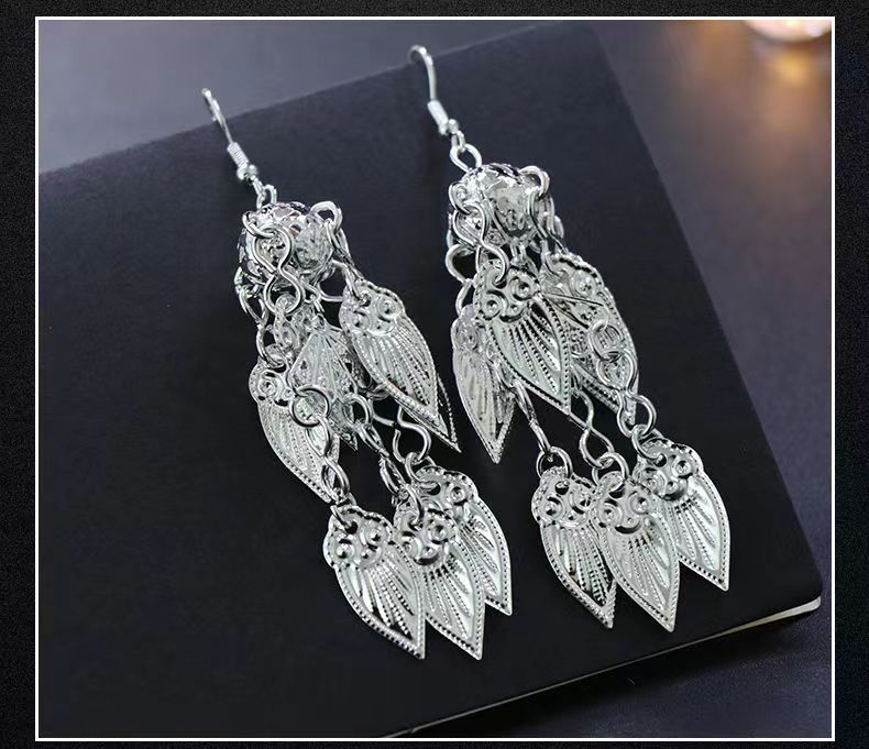Personality Horn Bloom Vintage Eardrops Yi Earrings