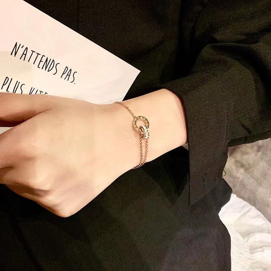 Women's Roman Font Titanium Steel Gold Design Bracelets