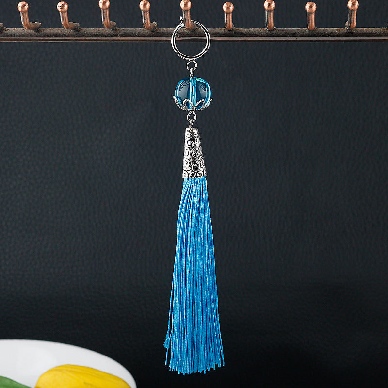 Travelers Empty Autumn Unilateral Temperament Feather Tassel Carved Earrings