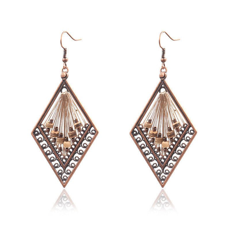 Women's Vintage Tassel Fashion U-shaped Hand-woven Exaggerated Earrings