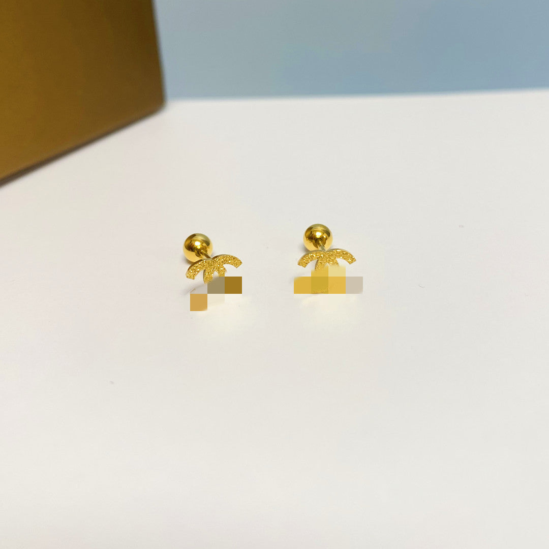 Women's Simple Small Golden Ear Bone Titanium Rings