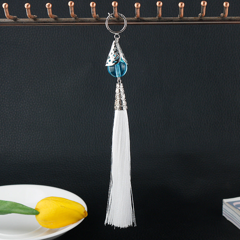 Travelers Empty Autumn Unilateral Temperament Feather Tassel Carved Earrings