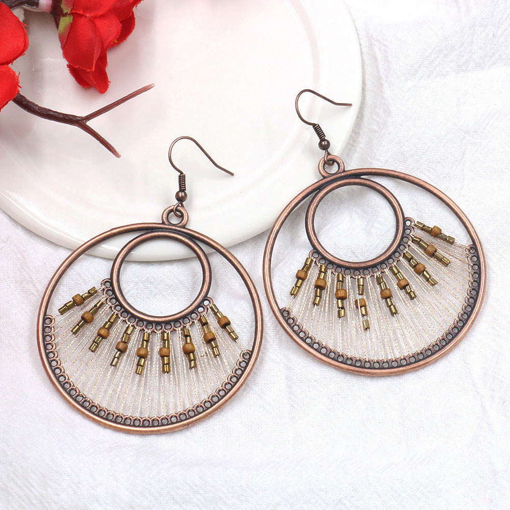 Women's Vintage Tassel Fashion U-shaped Hand-woven Exaggerated Earrings