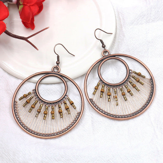 Women's Vintage Tassel Fashion U-shaped Hand-woven Exaggerated Earrings
