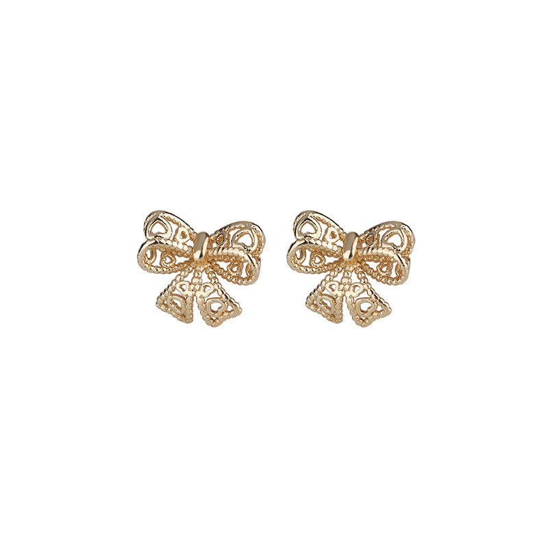 Women's Hollow Out Bow Simple Temperament Niche Earrings