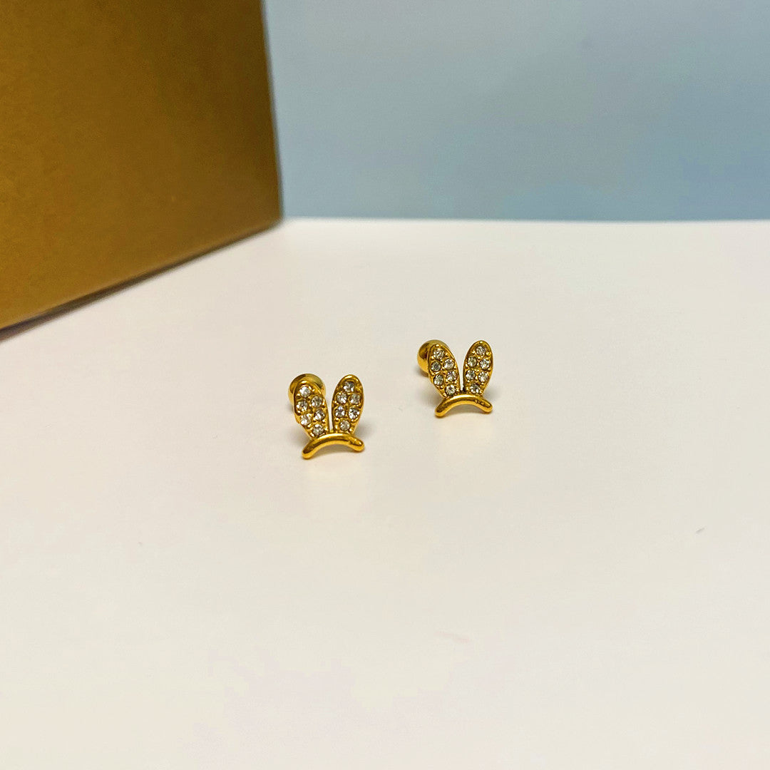 Women's Simple Small Golden Ear Bone Titanium Rings