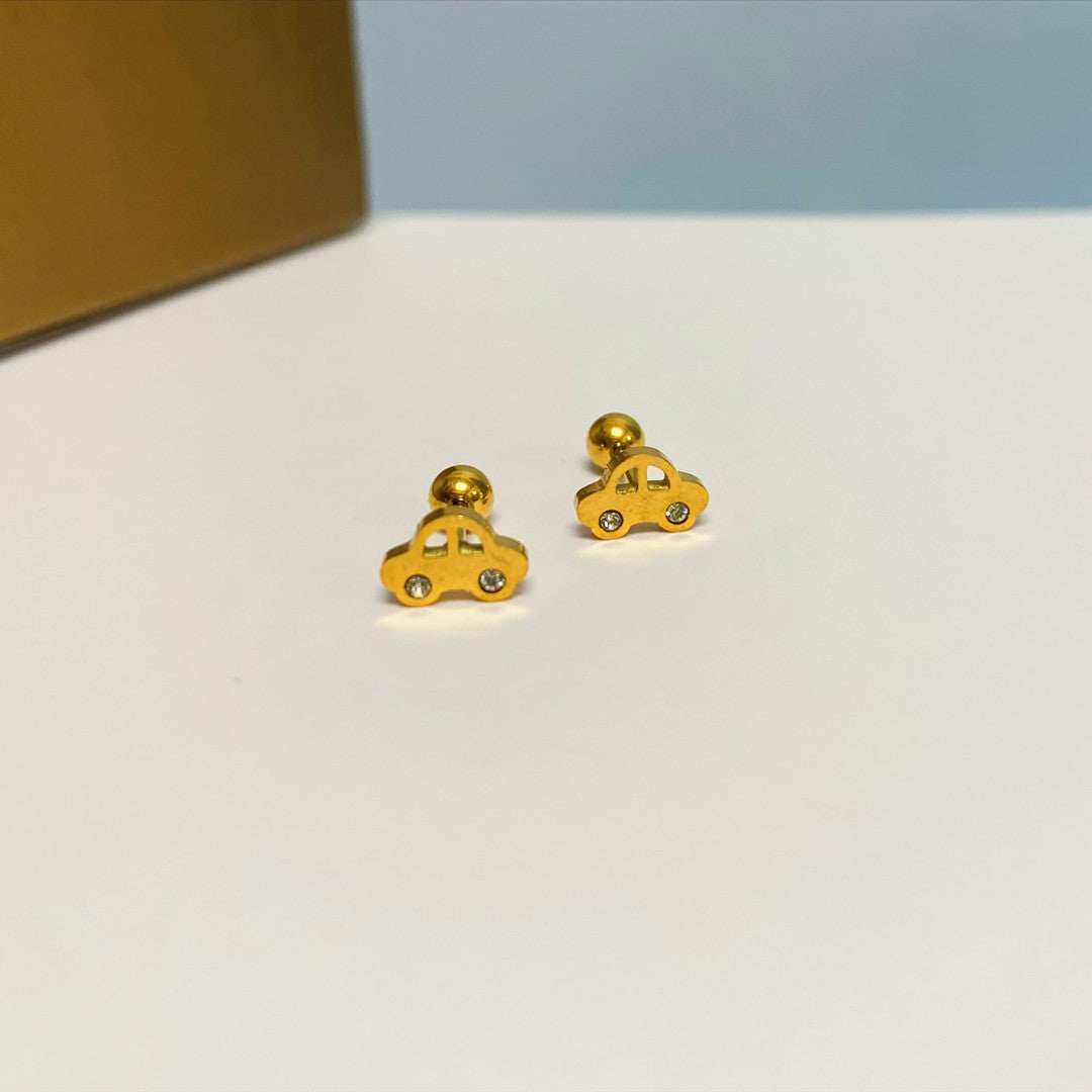 Women's Simple Small Golden Ear Bone Titanium Rings
