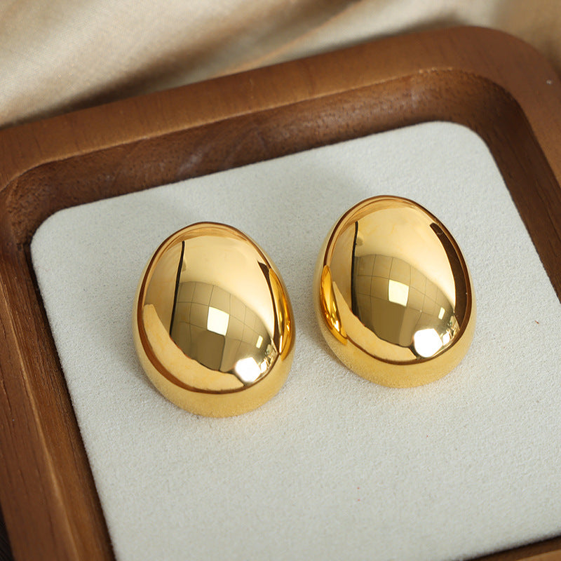 Personality Fashion Geometric Ornament Niche Oval Glossy Design Titanium Earrings