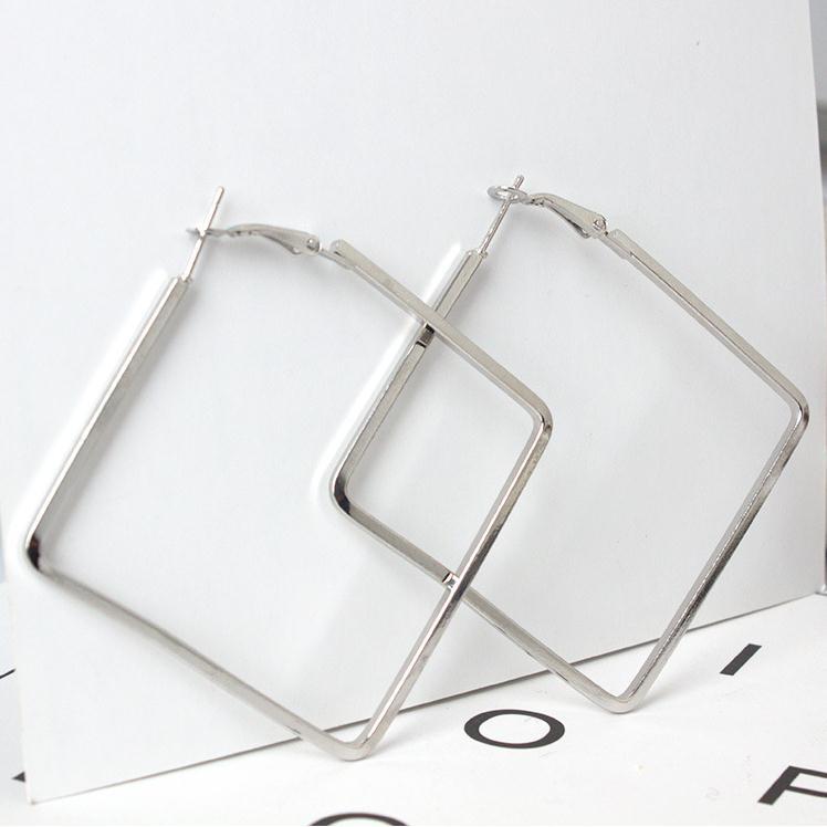 Flow Modern White Alloy Exaggerated Personalized Earrings