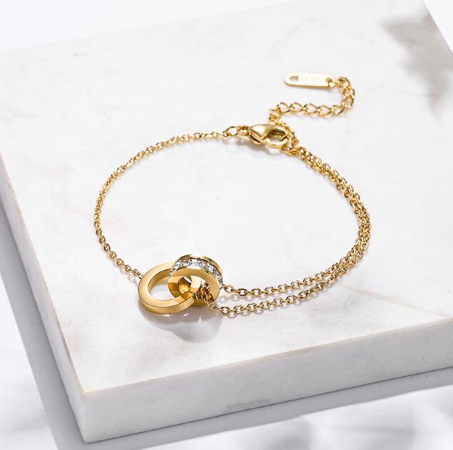 Women's Roman Font Titanium Steel Gold Design Bracelets