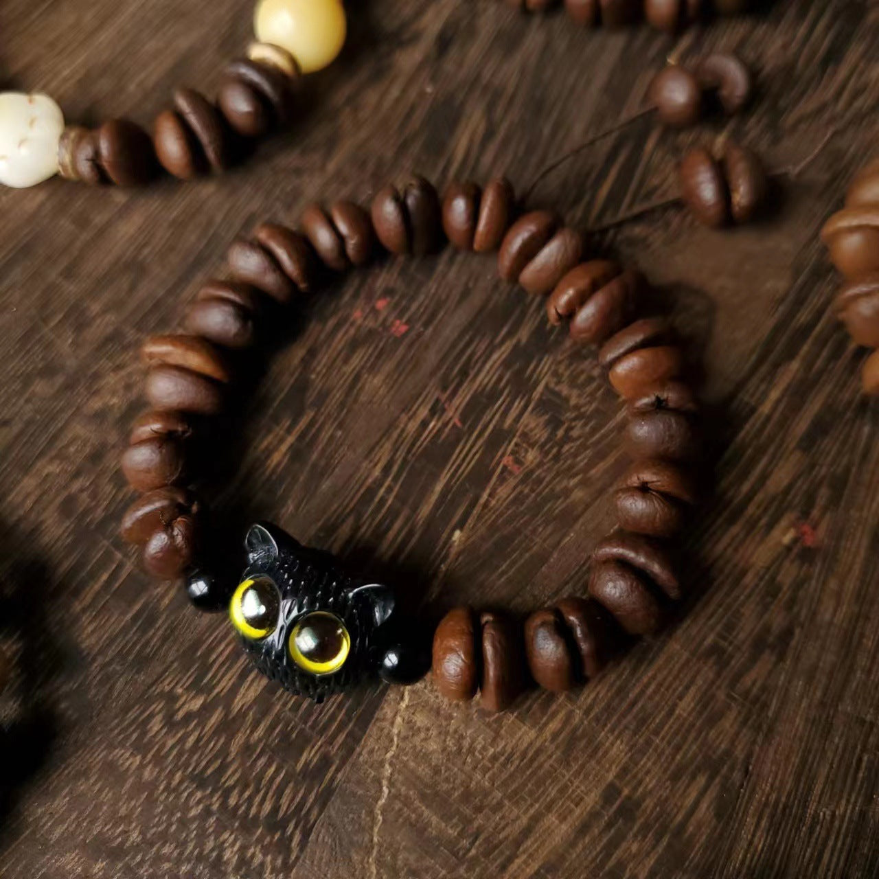 Coffee Bean Ebony Kitten Head Passion Fruit Seed Bracelets