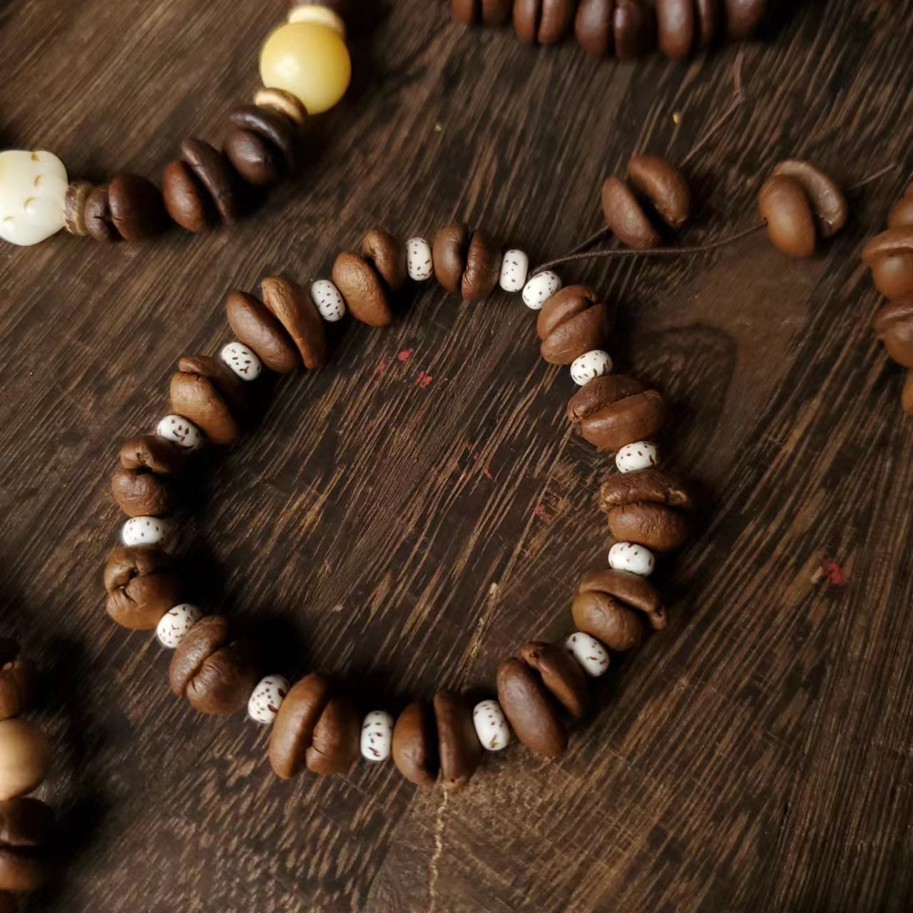 Coffee Bean Ebony Kitten Head Passion Fruit Seed Bracelets