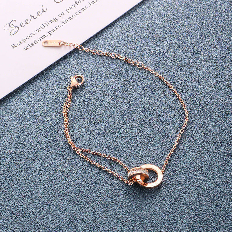 Women's Roman Font Titanium Steel Gold Design Bracelets