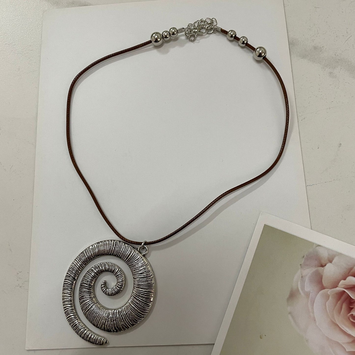 Women's Spiral Symbol Bohemian Retro Style Simple Ethnic Alloy Leather Necklaces