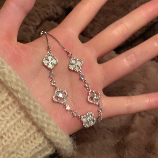 Four-leaf Flower Zircon Drawable Female Hollow Design Sense Exquisite Refined Bracelet