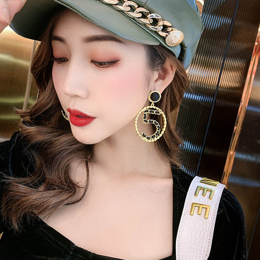 Dignified Simple Metal Woven Hollow Personality Texture Earrings