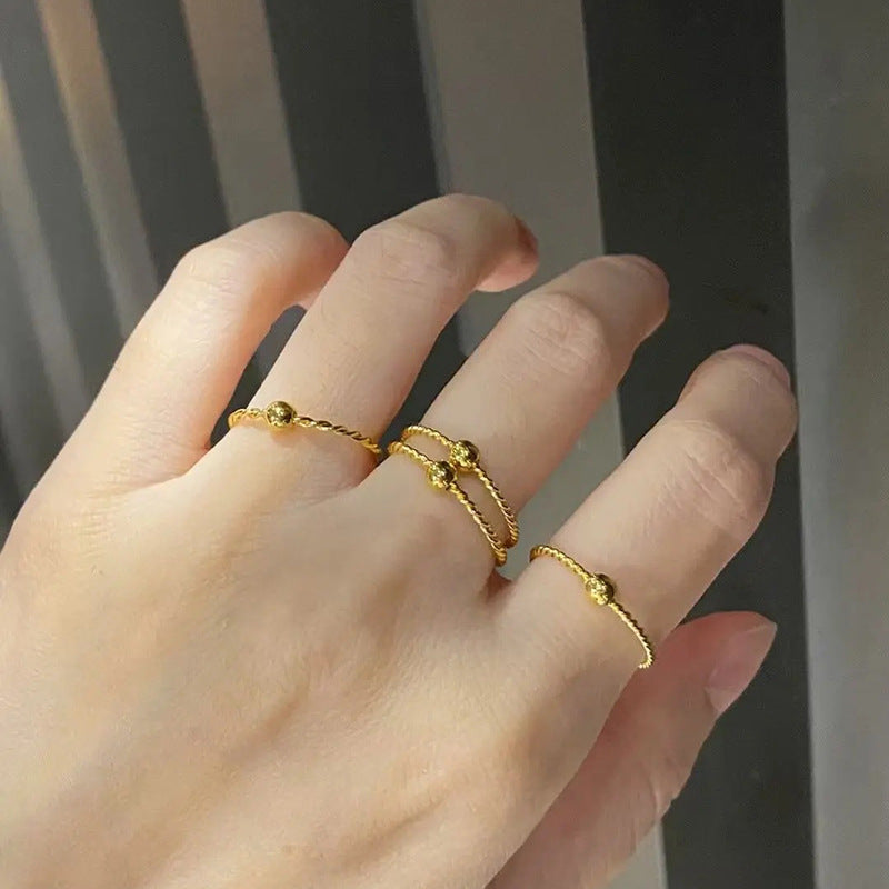 Women's No Fading Round Beads Twist Golden Bean Rings