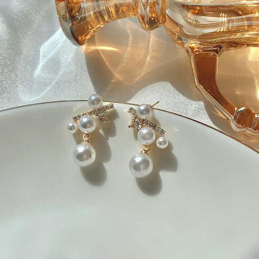 Temperamental Small Pearl Diamond Cross Design Earrings