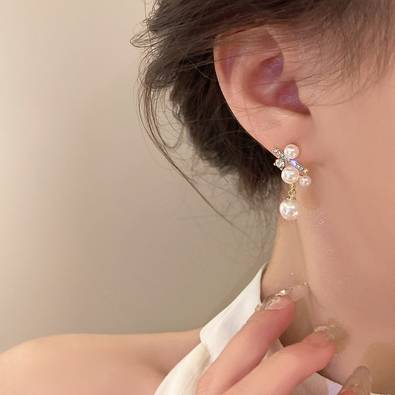Temperamental Small Pearl Diamond Cross Design Earrings