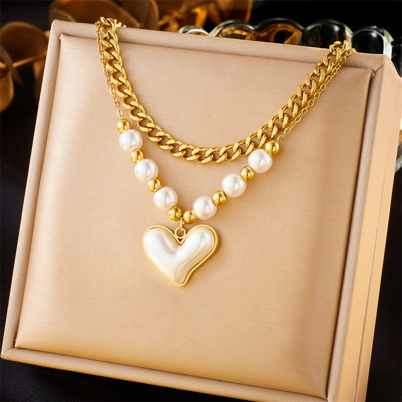 Retro Inlaid Pearl Heart Cross Eyes Pendants