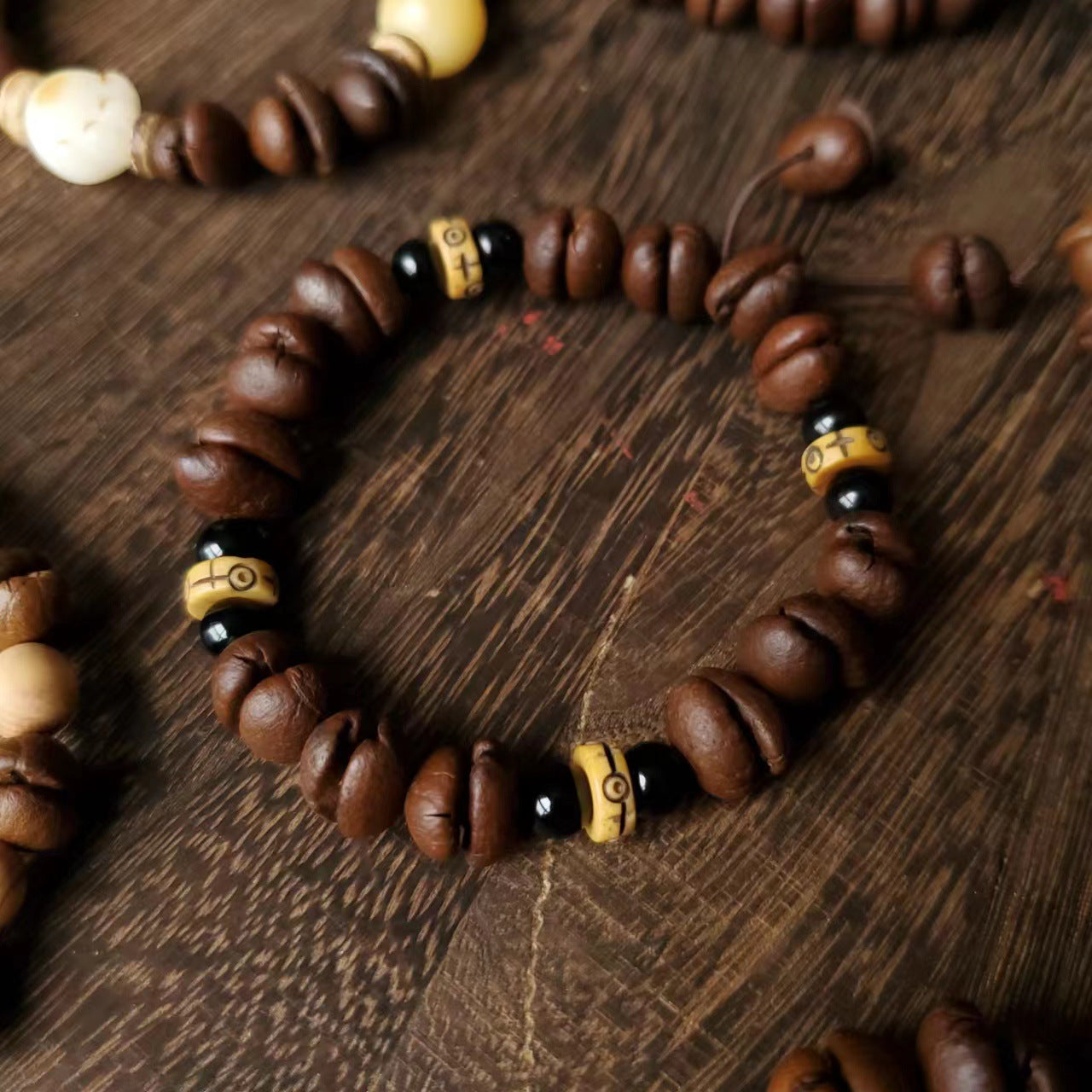 Coffee Bean Ebony Kitten Head Passion Fruit Seed Bracelets